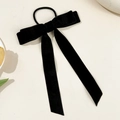 Elegant black velvet bow hair scrunchie with long ribbons for women on a white surface - Black