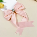 Barrette élégante en satin rose avec nœud papillon et centre en strass brillant - Rose