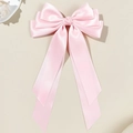 Detalle de pinza para el pelo de satén rosa con lazo de varias capas y cintas largas - Rosa