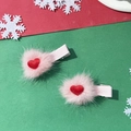 Detail of sweet pink faux fur heart hair clips with ribbon wrapped alligator base - Pink