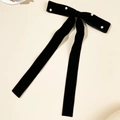 Detail of elegant black velvet bow hair clip with white faux pearls and long ribbons - Black