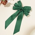 Detail view of dark green layered ribbon hair clip with elegant long streamers - Double Layer Bow Streamer Style / Dark Green