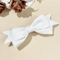 Detailed view of the elegant three-layer white satin swallowtail bow hair clip - White
