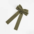 Detailed close-up of dark green velvet bow hair clip with long flowing ribbons - Olive Green