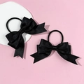 Detail of two black bow hair ties showing fine twill texture on pink background - Black (1 Pair)