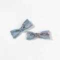 Detail of light blue denim hair bows with bronze sequins and fine fabric texture - Style 1 (Duckbill Clip)