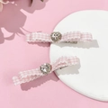 Set di due fermagli per capelli con fiocco a quadri rosa e cuore di cristallo su vassoio - Rosa