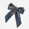 Close-up of blue denim bow hair clip with rose gold sequins on a white background - Style 3 (Spring Clip)
