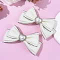 Barrettes noeuds en satin blanc avec perles en cœur et strass brillants pour femmes - Beige