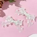 Set van twee witte organza haarspelden in balletstijl met hartvormige strikpatronen - Beige