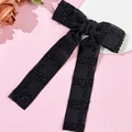 Detail einer schwarzen Tweed Schleifen Haarklammer mit langen Bändern und Pailletten - Schleife Streamer (1# Schwarz)