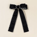 Close-up of black velvet bow hair clip with white scalloped lace edges and ribbon - Style 3 / Black Long Ribbon (White Scallop Edge)