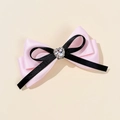 Pink and black ribbon bow hair clip with a sparkling heart-shaped crystal center - Pink with Black Edge