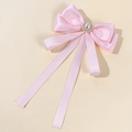 Detail of pink satin bow brooch with large pearl centerpiece and long ribbons - Light Pink