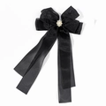 Detail of black mesh hair clip with layered satin ribbons, pearls, and rhinestones - Black