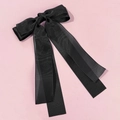 Close-up detail of double-layer black mesh bow hair clip with elegant long ribbons - Black