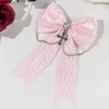 Detalle de pinza para el pelo con lazo de encaje rosa con circón de corazón y cruz gótica - Rosa