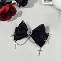 Detail of gothic lace bow hair clip featuring heart gem, silver crosses and metallic spikes - Black