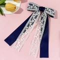 Pinza de pelo elegante con lazo de satén azul marino y encaje blanco con cintas largas - Azul marino