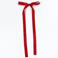 Detail of red satin ribbon bow hair clip with long streamers on white background - Red