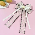 Elegant French lace bow hair clip with floral embroidery and long flowing ribbons - Beige