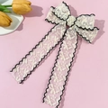 Elegante pinza para el pelo con lazo de encaje y bordado floral con cintas largas y bordes - Beige