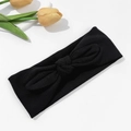 Detalle de diadema de punto acanalado negro con orejas de conejo y decoración de tulipán - Negro