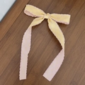 Detalle de pasador de lazo jacquard amarillo con bordes ondulados rosa y cintas - 4# (Amarillo Claro y Rosa Patchwork)