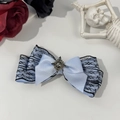 Detail of Gothic lace bow hair clip with light blue satin and vintage gemstone center - Blue