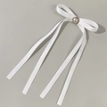 Elegant white satin ribbon bow hair clip with double layers and a central faux pearl accent - White