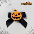 Detail of Halloween hair clip with orange felt pumpkin and black satin bow accessory - Pumpkin Style (1#)