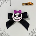 Detail of Halloween bow clip with glittery white skull and purple ribbon accents - Skull Jack Style (3#)