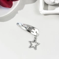 Detail of silver star pendant hair clip with zircons on white backdrop and bone props - Pave Rhinestone Hollow Star Pendant Style (1#)
