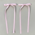 Pink satin ribbon hair bow clips for women featuring long elegant flowing streamers - Pink
