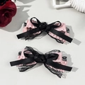 Lolita style pink ribbon and black lace bow hair clips with rose detail - Pink