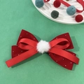Dettaglio del fiocco per capelli in velluto rosso con perline e pompon bianco natalizio - Rosso