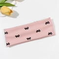 Fascia elastica rosa in maglia con stampe a fiocco nero e trama di tessuto a costine - Rosa