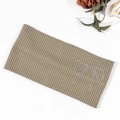 Detail of khaki ribbed knit headband with sparkling rhinestone bow and elastic texture - Khaki