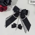 Barrette nœud en dentelle gothique avec strass cœur, chaîne de perles et détails de croix - Noir