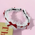Serre-tête en dentelle blanche avec nœuds rouges sur fond rose pour coiffure femme - Rouge