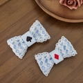 Close-up of blue Lolita lace bow hair clips with poker card heart and spade embroidery - Style 1 (One Pair)
