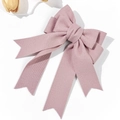 Eleganter altrosa Haarschmuck mit langer Schleife auf weißem Grund mit Tulpendeko - Rosa