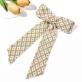Detalle de lazo floral para el cabello con cintas largas estilo vintage francés - Albaricoque