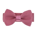 Gros plan d'un nœud en ruban gros-grain rose poudré montrant la texture du tissu - Rose Coréen Foncé