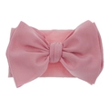 Detailed macro view of pink nylon headband featuring a large textured fabric bow - Pink
