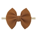 Brown waffle-textured bow on a beige nylon baby headband for infants and toddlers - Coffee