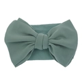 Elastic baby headband featuring a large dark green bow with textured fabric finish - Bean Green
