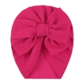 Detail of rose red infant turban hat featuring textured fabric and a large bow - One Size / Rose Red