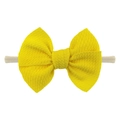 Diadema para bebé con lazo amarillo y textura gofrada con banda de nailon suave - Amarillo