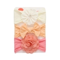 Three-pack soft nylon baby headbands with flowers and bows in cream, orange, and pink - Off-white/Light Orange/Pink (DP326-7)